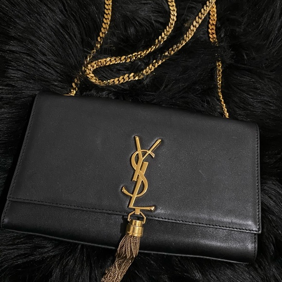 ysl gold tassel